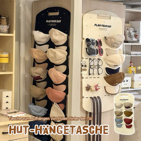 Hatten hænger i tasken bag døren 🌟🎩